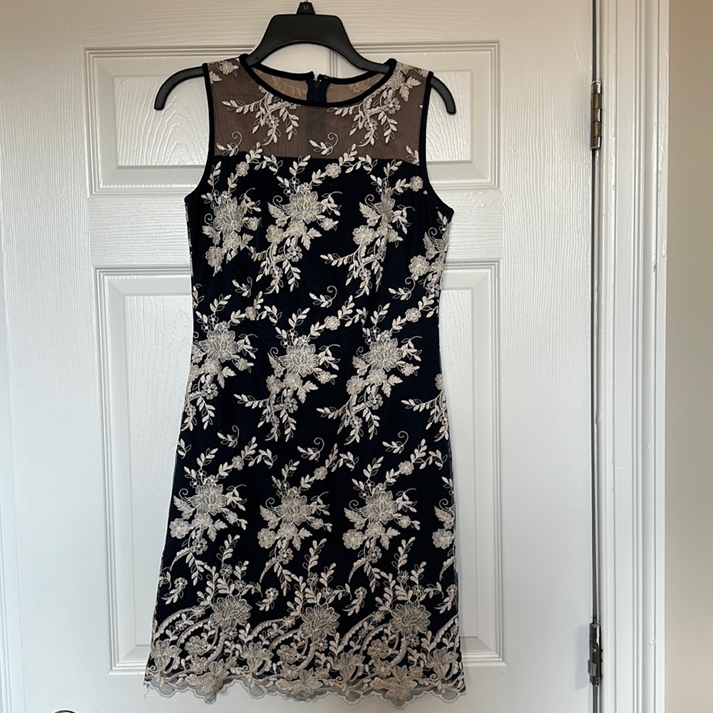 Navy dress with white lace appliqué. Ralph Lauren size 6. Worn once